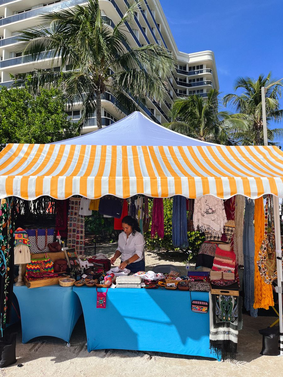 Vendor selling textiles and crafts
