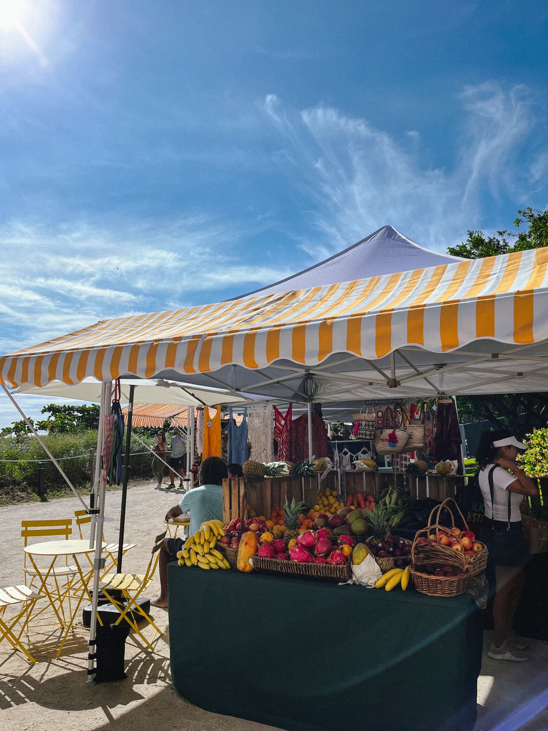 Fruit display under a striped tent